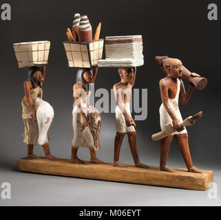 This model shows a procession of offering bearers, illustrating an ...
