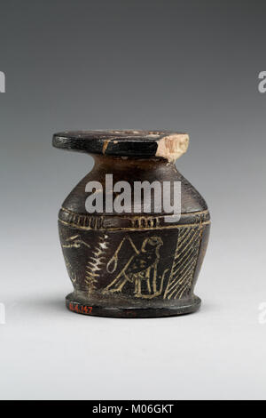 Kohl jar decorated wtih Horus falcon and grotesque figure MET 01.4.147 EGDP021618 Stock Photo