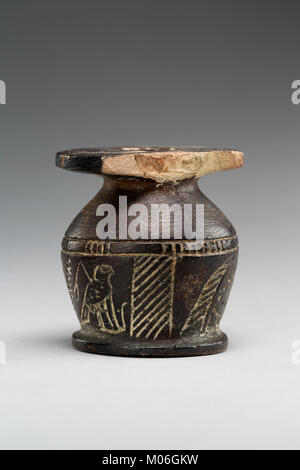 Kohl jar decorated wtih Horus falcon and grotesque figure MET 01.4.147 EGDP021619 Stock Photo