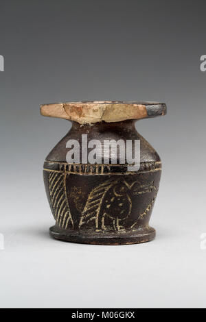 Kohl jar decorated wtih Horus falcon and grotesque figure MET 01.4.147 EGDP021620 Stock Photo