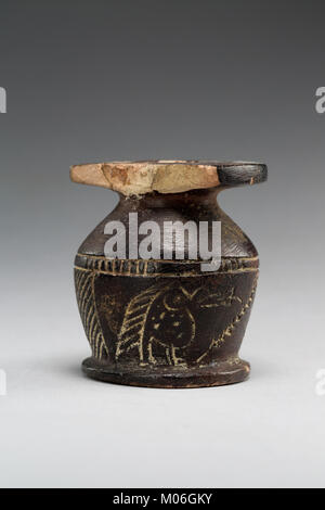 Kohl jar decorated wtih Horus falcon and grotesque figure MET 01.4.147 EGDP021621 Stock Photo
