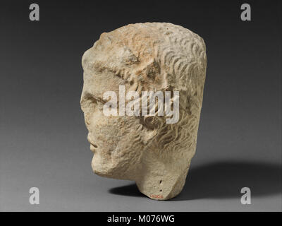 Limestone head of a bearded male votary MET DP208981 Stock Photo