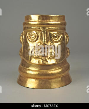 This ceramic beaker has an inverse-face design, illustrating artistic ...
