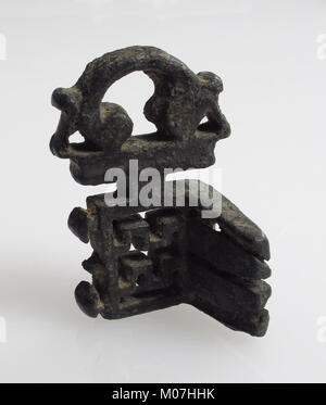 An ancient key, possibly used in locking mechanisms or as a symbol of ...