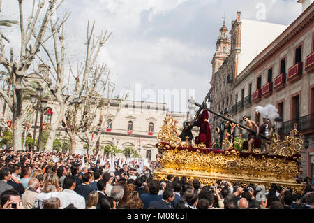 Float of Christ of the brotherhood of 'La Paz' leaving the Cathedral of Seville during its penance station on Palm Sunday. Stock Photo