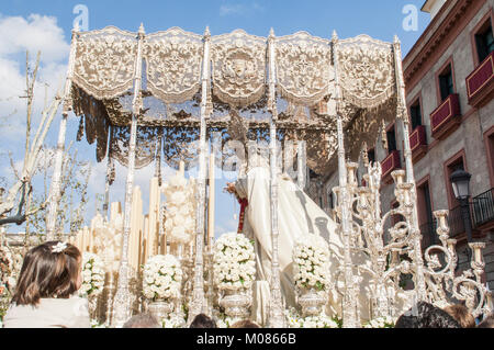 Color photograph of the pallium float of the 'Virgen de la Paz', of the brotherhood of 'La Paz' in its processional journey on Palm Sunday. Stock Photo