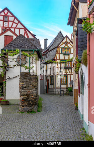 Public street view with romantic half-timbered houses of Bacharach on the Rhine. Rhineland-Palatinate. Germany. Stock Photo