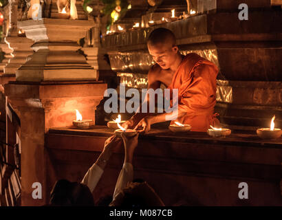 Novice Monks conducting prayers at Yi Peng Festival, Chiang Mai, Thailand Stock Photo