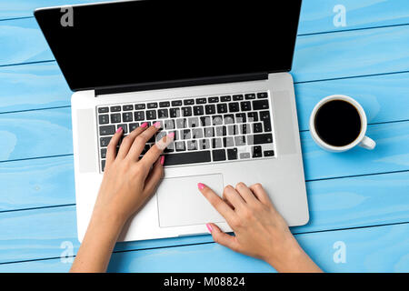 Woman using modern laptop Stock Photo