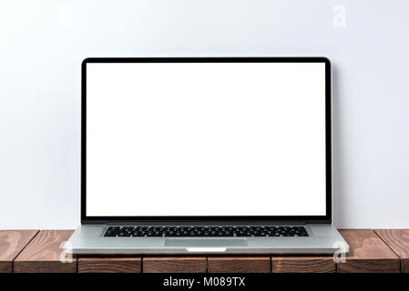 Modern laptop with clear white screen. Close up Stock Photo