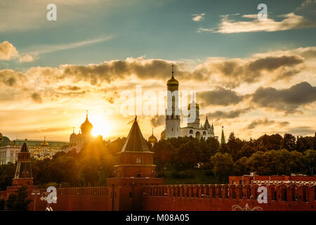 Belfry of Ivan the Great Cathedral in the Kremlin in Moscow on a background of a beautiful sunset Stock Photo