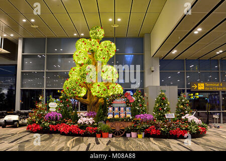 Singapore, Singapore - December 11, 2017. Interior view of Changi International Airport in Singapore with New Year installation Stock Photo