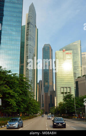 Singapore, Singapore - December 11, 2017. Street view in Marina Bay district of Singapore, with cars, skyscrapers and vegetation. Stock Photo