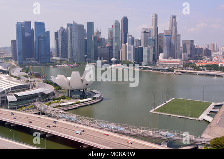 Singapore, Singapore - December 11, 2017. View over Marina Bay in Singapore, with Float stadium, ArtScience Museum and skyscrapers. Stock Photo