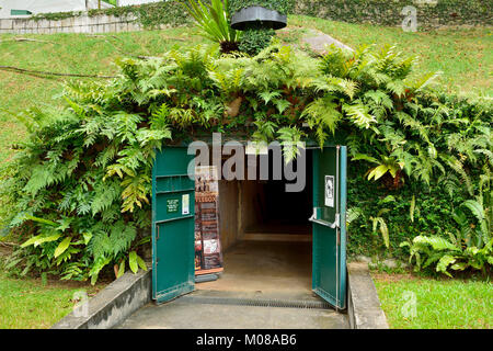 Singapore, Singapore - December 11, 2017. Exterior view of the entrance to the Battle Box Museum at Fort Canning in Singapore, with vegetation. Stock Photo