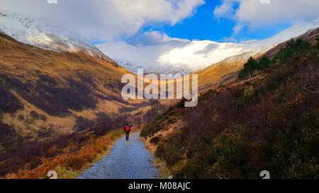 Walking in Scotland. This is the path leading to peaks in Mamore near Kinlochleven. The weather can change quickly and catch out the unwary walker. model release available. From the archives of Press Portrait Service (formerly Press Portrait Bureau) Stock Photo