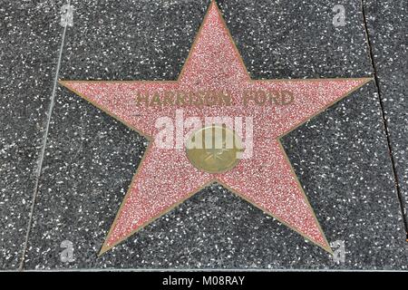 LOS ANGELES, USA - APRIL 5, 2014: Harrison Ford star at famous Walk of Fame in Hollywood. Hollywood Walk of Fame features more than 2,500 stars with i Stock Photo