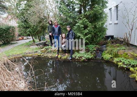 The four-piece German rock band Okta Logue consists of Benno Herz (bassist/vocalist), his brother Robert Herz (drums), Philip Meloi (guitarist), and Nicolai Hildebrandt (organ, synthesizers and trumpet). Germany, 10/04 2013. Stock Photo