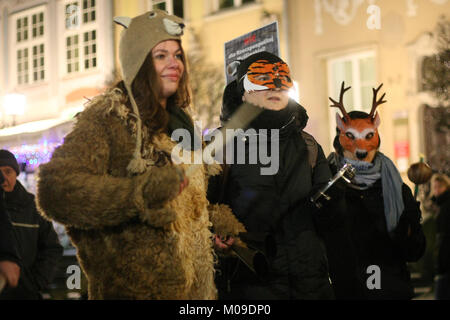 Gdansk, Poland. 19th Jan, 2018. Gdansk, Poland January 19th, 2018 Protesters holding banners, with anti-hunting slogans are seen. Few hundred people protested against new hunting law introduced by the Polish government. People demanded to ban participation of children in hunting, increase of the distance allowed for hunting from houses and private properties, and elimination of punishment for so called disturbing in hunting Credit: Vadim Pacajev/Alamy Live News Stock Photo