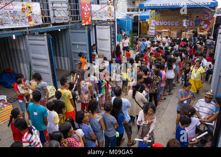 Ceby City, Philippines. 20th Jan, 2018. Numbering in the hundreds of thousands Filipino Catholics descend upon Cebu City for the annual Sinulog Festival, one of the largest religious festivals in the Philippines.To cater for the mass influx the Cebu City Government makes temporary accommodation available in the form of shipping containers. Approximately 88 containers will house up to 1200 religious devotees with 20 people to a container. Credit: imagegallery2/Alamy Live News Stock Photo