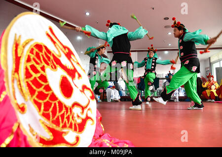 Jinan, China's Shandong Province. 19th Jan, 2018. Actors of Guzi yangge dance troupe rehearse at a culture center in Shanghe County, east China's Shandong Province, Jan. 19, 2018. Invited by the China Cultural Center in Stockholm, the troupe will participate in Spring Festival celebration events in Sweden from Feb. 9 to 14. Credit: Guo Xulei/Xinhua/Alamy Live News Stock Photo