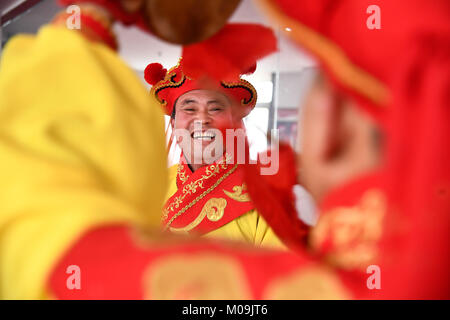 Jinan, China's Shandong Province. 19th Jan, 2018. Actors of Guzi yangge dance troupe rehearse at a culture center in Shanghe County, east China's Shandong Province, Jan. 19, 2018. Invited by the China Cultural Center in Stockholm, the troupe will participate in Spring Festival celebration events in Sweden from Feb. 9 to 14. Credit: Guo Xulei/Xinhua/Alamy Live News Stock Photo