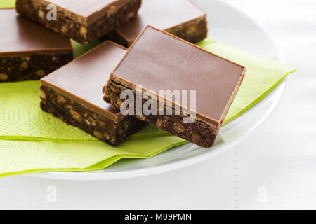 Tiffin or fridge cake a confection made with cocoa crushed biscuit dried fruit and melted chocolate then chilled Stock Photo