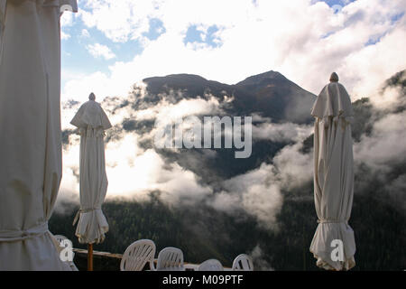 View from hotel in Switzerland with clouds over the Alps Stock Photo