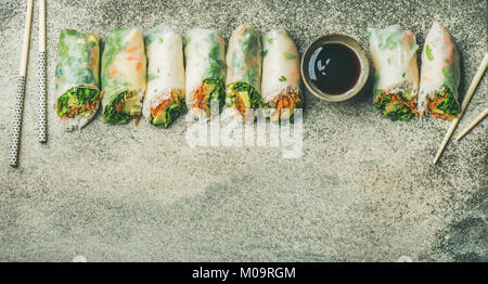 Flat-lay of vegan spring or summer rice paper rolls Stock Photo