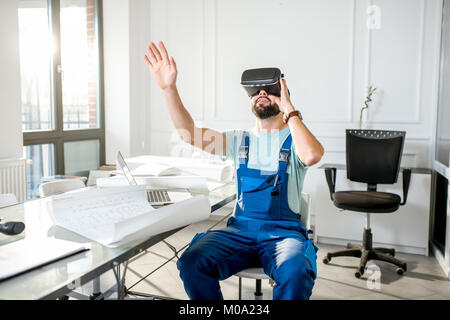 Foreman using vr glasses to imagine projected environment Stock Photo