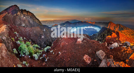 Panoramic sunrise view of Mount Rinjani, Lombok, Indonesia Stock Photo