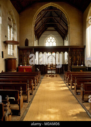 Nave of St Helen's Church, Ranworth, late C15th painted rood screen with north (L) & south (R) side altars, & high altar in chancel beyond the screen. Stock Photo