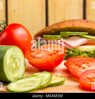 Salad Sandwich Roll Representing Tomato Pieces And Rolls Stock Photo