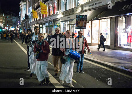 London, UK. 18th January, 2018. Devotees of Hare Krishna from the Radha-Krishna Temple chant in Regent Street. Stock Photo