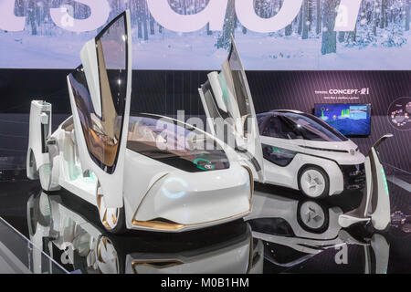 Detroit, Michigan - Toyota's Concept-i self-driving car (left) on display at the North American International Auto Show. At right is the two-seater Co Stock Photo