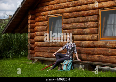 young woman with nordic walk pols Stock Photo