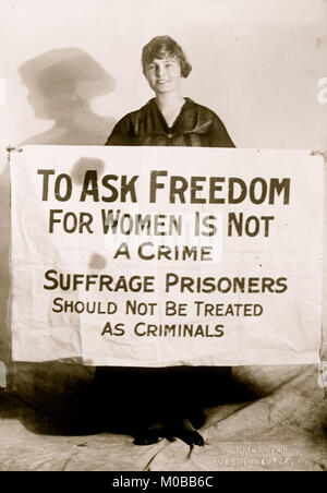 Suffragette Lucy Branham with Posters Stock Photo