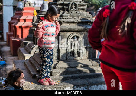 children at Kaathe Swyambhu Shee Temple: Gha: Chaitya Stock Photo