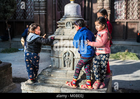 children at Kaathe Swyambhu Shee Temple: Gha: Chaitya Stock Photo