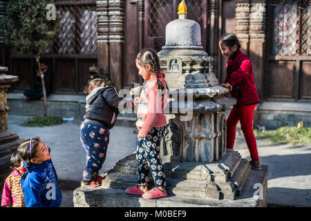 children at Kaathe Swyambhu Shee Temple: Gha: Chaitya Stock Photo