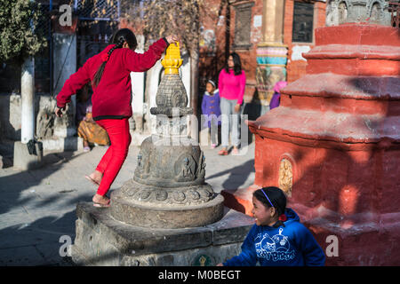 children at Kaathe Swyambhu Shee Temple: Gha: Chaitya Stock Photo