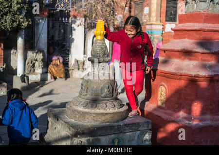 children at Kaathe Swyambhu Shee Temple: Gha: Chaitya Stock Photo