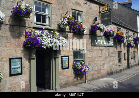 Colourful Hanging Baskets and Window Boxes Outside The Atlantic Hotel ,Hugh Town, St Marys Island, Isles of Scilly, England, Cornwall, UK. Stock Photo