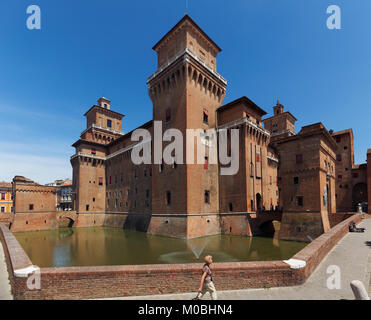 Ferrara, Italy - June 17, 2017: People at Castello Estense, or St. Michael's castle, a moated medieval castle in the center of Ferrara. Historical par Stock Photo