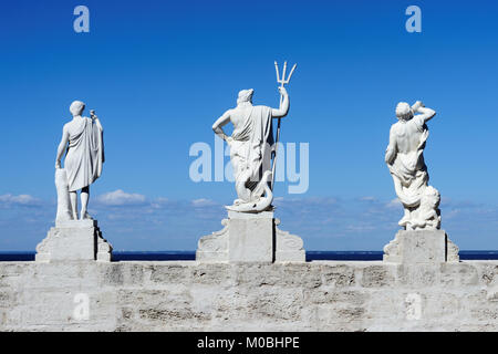 Peterhof, St. Petersburg, Russia - June 4, 2017: Sculptures of Neptune, Triton, and Bacchus on the top of the Golden Hill cascade. The cascade was bui Stock Photo