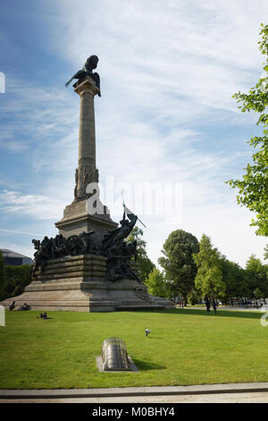 Porto, Portugal - May 8, 2017: People on the square Rotunda da Boavista also known as the Praca de Mouzinho de Albuquerque. The monument is erected in Stock Photo