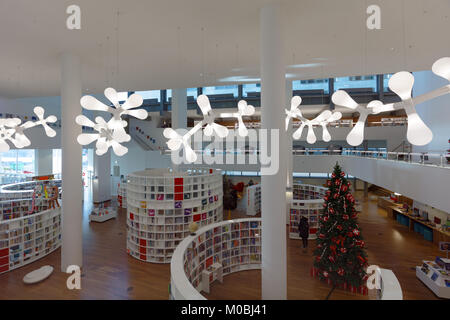 Amsterdam, Netherlands - January 02, 2017: People in the Central Public Library. The building was opened on July 7, 2007, designed by Jo Coenen and th Stock Photo