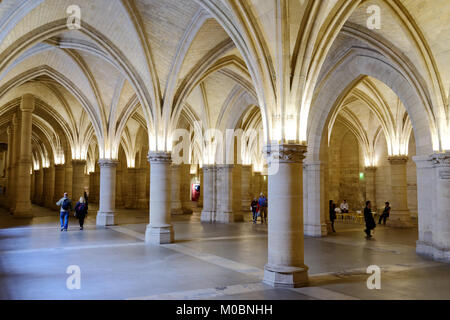 Paris, France - September 13, 2013: Tourist in Salle des Gens d'Armes in Conciergerie. The hall was built under King Philip the Fair, still remain fro Stock Photo