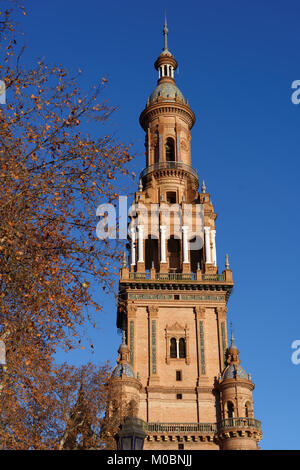 Seville, Spain - January 3, 2012: South tower of Plaza de Espana. Built in 1928, Plaza de Espana is a landmark example of the Renaissance Revival styl Stock Photo