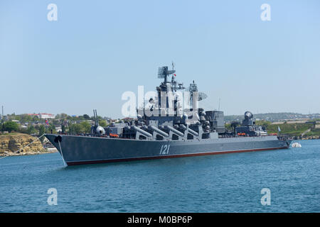 Sevastopol, Ukraine - May 7, 2013: Russian cruiser Moskva anchored in the bay of Sevastopol, Crimea, Ukraine on May 7, 2013. Ship prepares to the nava Stock Photo